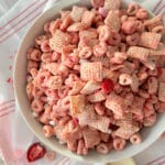 white bowl with strawberry chex mix