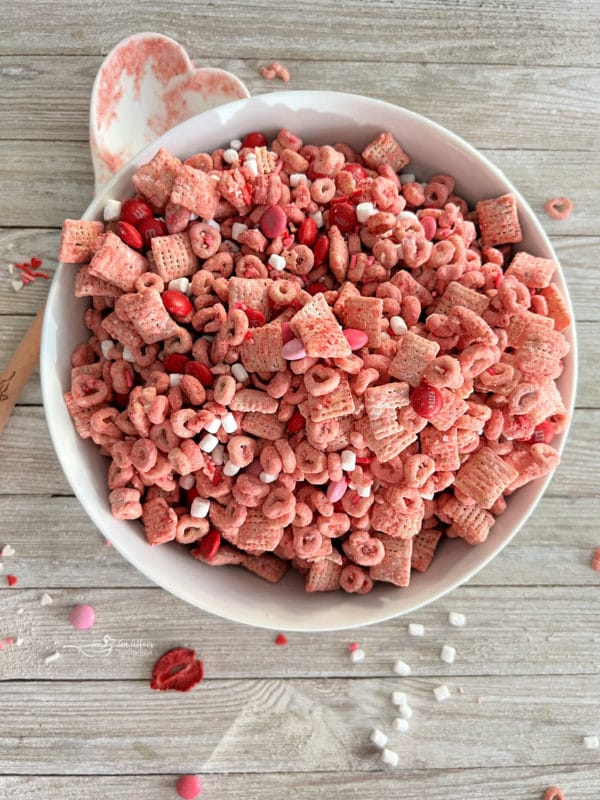 white bowl with strawberry chex mix 