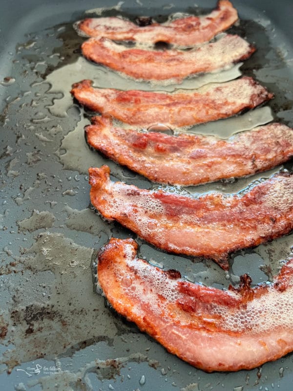 bacon cooking in pan 