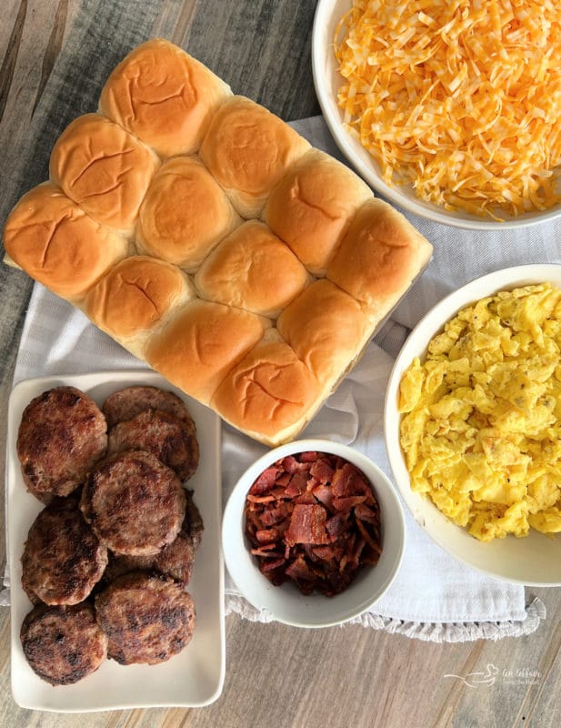 rolls, cheese, eggs, bacon, sausage for sliders