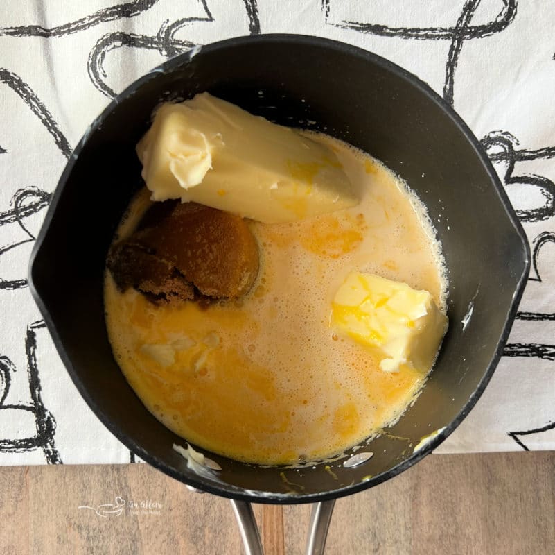 melting butter in saucepan with sugar, vanilla, and evaporated milk 