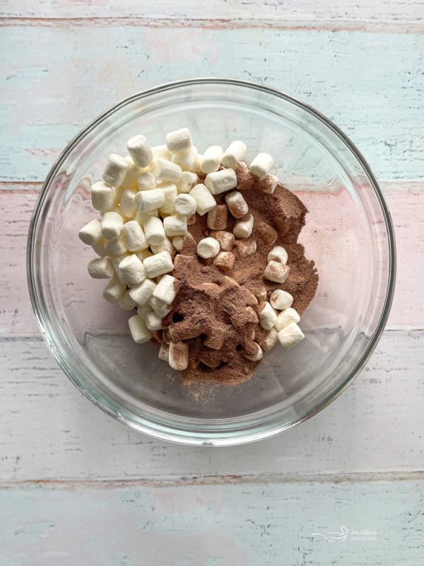 mix hot cocoa powder and mini marshmallows