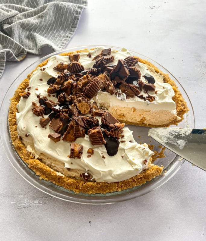 Whole Peanut Butter Pie with One Slice Taken Out