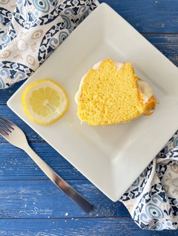 Lemon Cake with Slice of Lemon on Plate