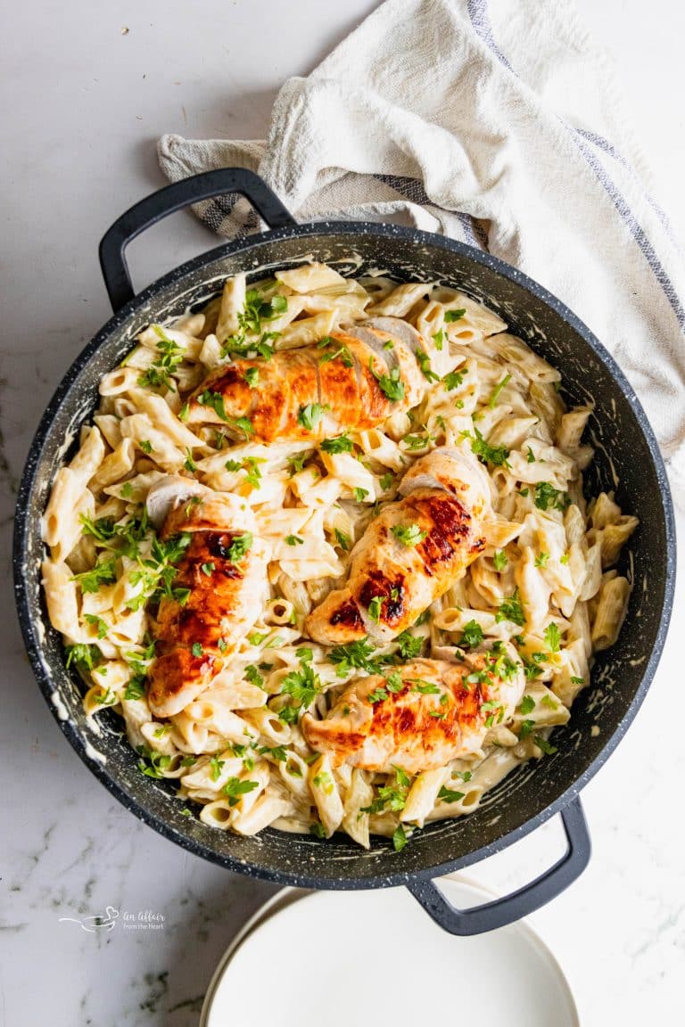 One Pot Creamy Chicken Penne Pasta in black skillet