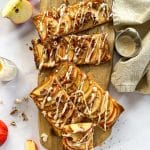 Overhead of Puff Pastry Apple Tarts on a Wood board