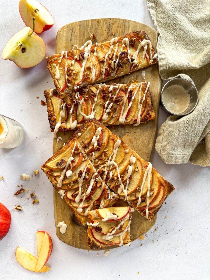 Overhead of Puff Pastry Apple Tarts on a Wood board