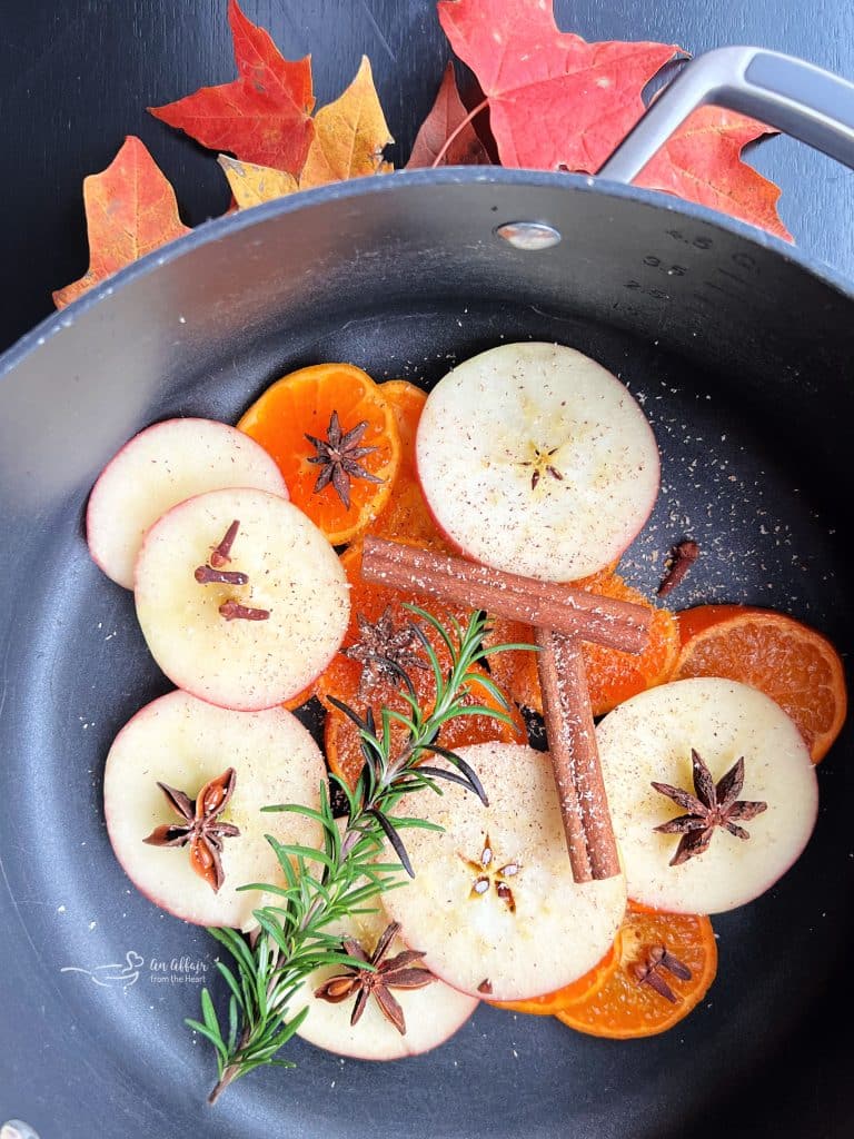 Fruit and spices in a pot.