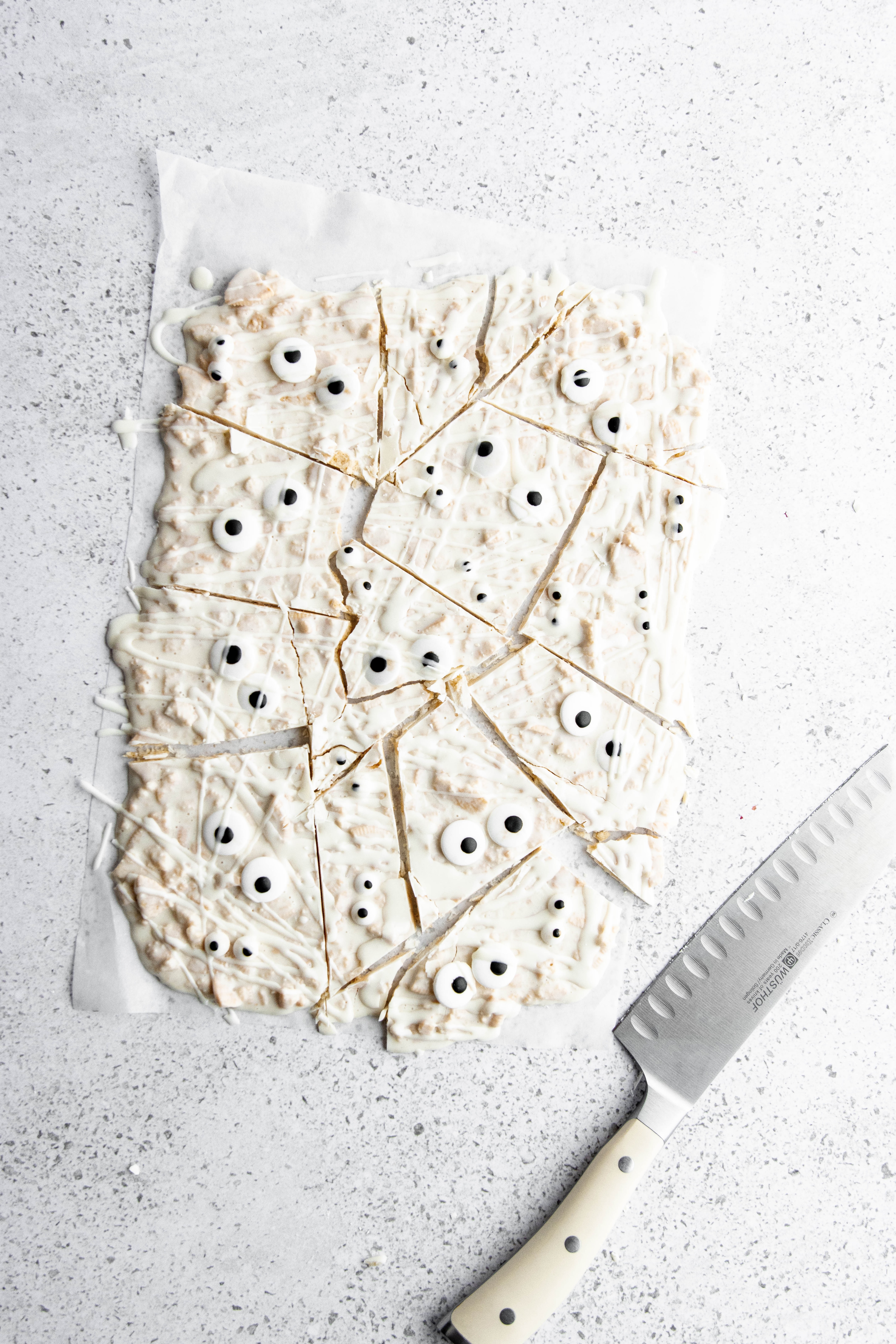 Hauntingly Simple Oreo Mummy Bark 15 White chocolate drizzled over the cooled mummy bark