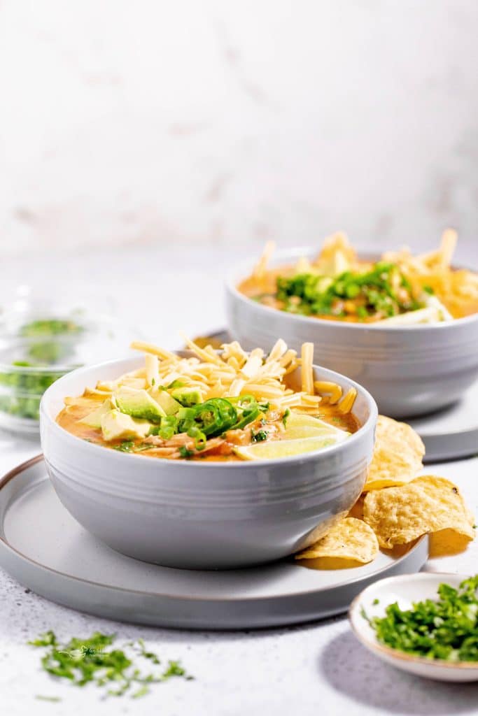 Mexican Style Leftover Turkey Soup in a white bowls