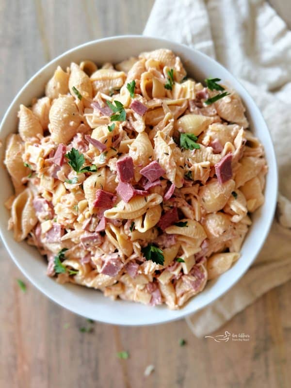 Close up look of all the ingredients in a bowl of Reuben Pasta Salad.